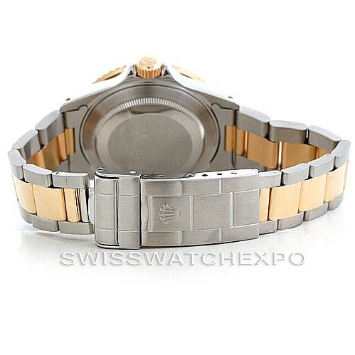 The image shows the back view of a Rolex Submariner 16613 Men's Steel and Gold (two tone) Blue Dial 16613 Men's Steel and Gold (two tone) Blue Dial, highlighting the watch's clasp and bracelet.