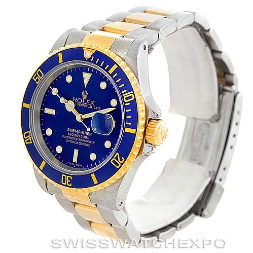 The image shows a side profile view of a Rolex Submariner 16613 Men's Steel and Gold (two tone) Blue Dial 16613 Men's Steel and Gold (two tone) Blue Dial watch, highlighting its blue dial, gold bezel, and two-tone bracelet.