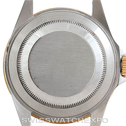 The image shows the back case of a Rolex Submariner 16613 Men's Steel and Gold (two tone) Blue Dial 16613 Men's Steel and Gold (two tone) Blue Dial watch, viewed directly from the back.