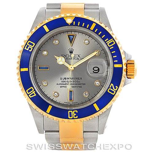 The image shows a front view of a Rolex Submariner 16613 Men
s Steel and Gold (two tone) Grey Dial 16613 Men
s Steel and Gold (two tone) Grey Dial watch, highlighting its blue and gold bezel, dial, and bracelet.