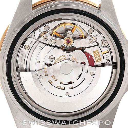 This image shows the back view of a Rolex Submariner 16613 Men
s Steel and Gold (two tone) Grey Dial 16613 Men
s Steel and Gold (two tone) Grey Dial, revealing its intricate internal movement mechanism.