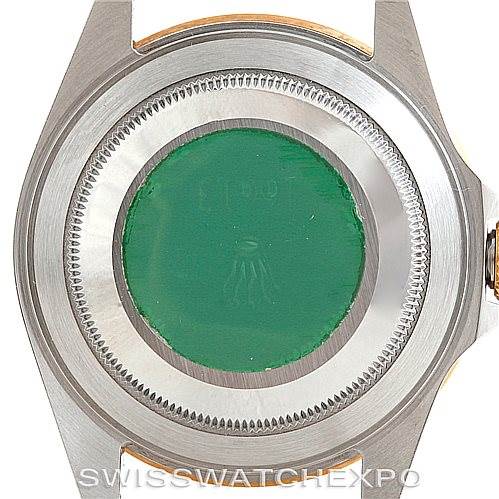 This image shows the case back of a Rolex Submariner 16613 Men
s Steel and Gold (two tone) Grey Dial 16613 Men
s Steel and Gold (two tone) Grey Dial watch from a straight-on angle.