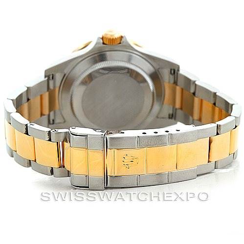 The image shows the back case and bracelet of a Rolex Submariner 16613 Men's Steel and Gold (two tone) Black Dial 16613 Men's Steel and Gold (two tone) Black Dial, highlighting the two-tone metal links.