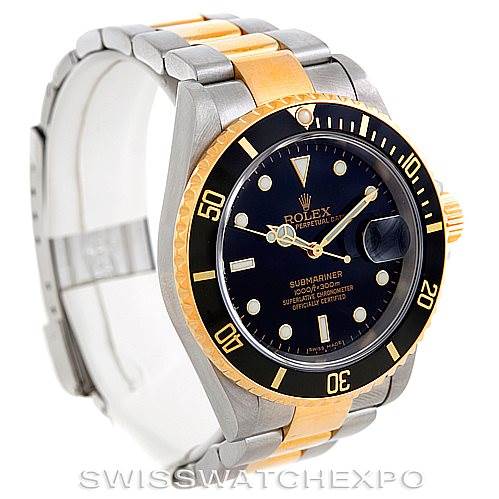 The image shows a Rolex Submariner 16613 Men's Steel and Gold (two tone) Black Dial 16613 Men's Steel and Gold (two tone) Black Dial watch at a slight angle, highlighting the dial, bezel, crown, and part of the two-tone bracelet.