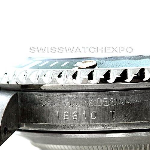 This is a close-up view of a Rolex Submariner 16610T Men
s Stainless Steel Black Dial 16610T Men
s Stainless Steel Black Dial
s side profile, showing its bezel and case with model number 16610.