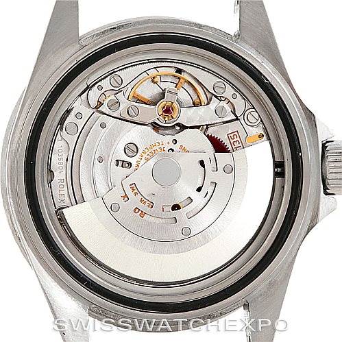 This image shows the back view of the movement and internal mechanism of a Rolex Submariner 16610T Men
s Stainless Steel Black Dial 16610T Men
s Stainless Steel Black Dial watch.