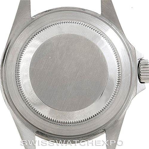 This is the case back of a Rolex Submariner 16610T Men
s Stainless Steel Black Dial 16610T Men
s Stainless Steel Black Dial watch, viewed from the back showcasing the crown and lugs.