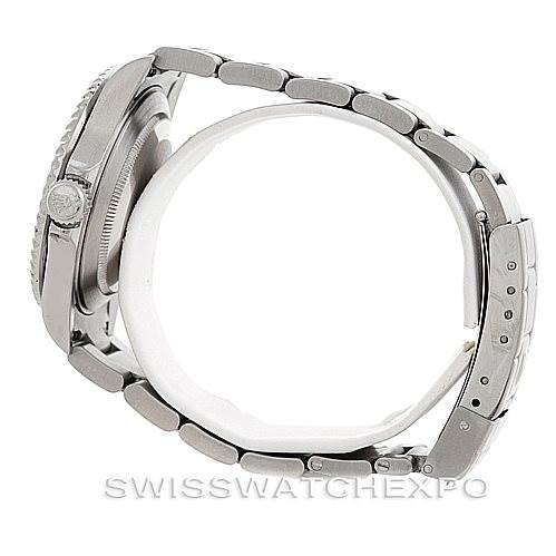 This image shows the side view of a Rolex Submariner 16610T Men
s Stainless Steel Black Dial 16610T Men
s Stainless Steel Black Dial watch, highlighting the crown, case, and metal bracelet.