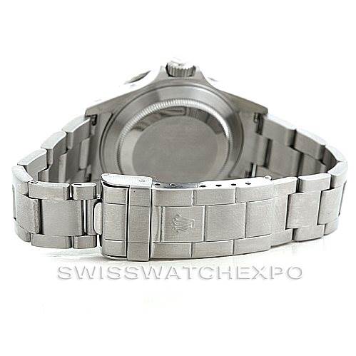 The image shows the backside of the Rolex Submariner 16610T Men
s Stainless Steel Black Dial 16610T Men
s Stainless Steel Black Dial watch, highlighting its clasp, bracelet, and case back.