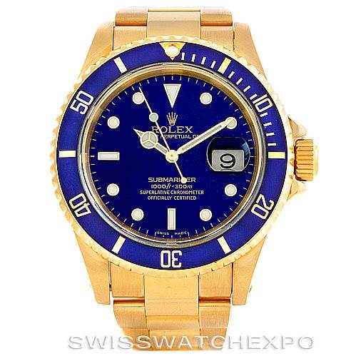 The image shows a front view of a Rolex Submariner 16618 Men's Yellow Gold Blue Dial 16618 Men's Yellow Gold Blue Dial watch with a gold band and a blue dial and bezel.