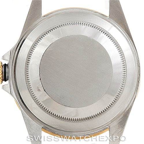 This image shows the case back of a Rolex Submariner 16613 Men's Steel and Gold (two tone) Grey Dial 16613 Men's Steel and Gold (two tone) Grey Dial watch from a rear angle.