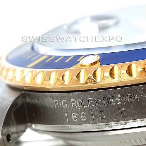 This image shows a close-up of the side of a Rolex Submariner 16613 Men's Steel and Gold (two tone) Grey Dial 16613 Men's Steel and Gold (two tone) Grey Dial watch, highlighting the bezel and "16613 T" model number.