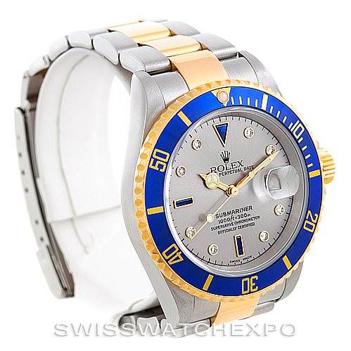 This Rolex Submariner 16613 Men's Steel and Gold (two tone) Grey Dial 16613 Men's Steel and Gold (two tone) Grey Dial watch is angled to show the front face, bezel, and a side view of the bracelet.