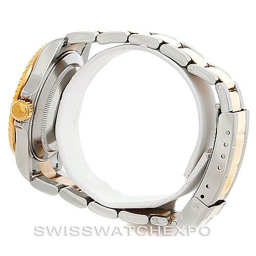 The image shows a side view of the Rolex Submariner 16613 Men's Steel and Gold (two tone) Grey Dial 16613 Men's Steel and Gold (two tone) Grey Dial watch, focusing on the bracelet and the crown.