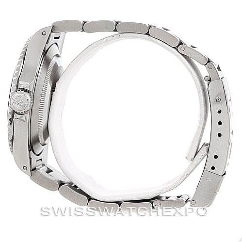 The image shows the side view of a Rolex Submariner 14060 Men
s Stainless Steel Black Dial 14060 Men
s Stainless Steel Black Dial watch, highlighting the bracelet, bezel, and crown.