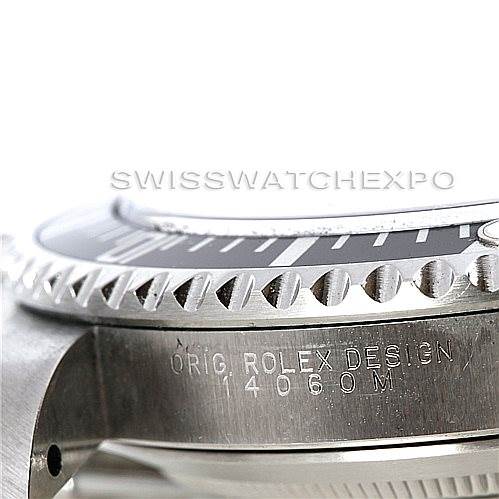 This image of the Rolex Submariner 14060 Men
s Stainless Steel Black Dial 14060 Men
s Stainless Steel Black Dial shows a close-up of the bezel, case, and model number engraving.