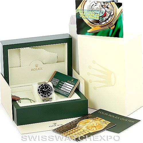 The image shows a Rolex Submariner 14060 Men
s Stainless Steel Black Dial 14060 Men
s Stainless Steel Black Dial watch in its box, along with Best Quality
ation cards, manuals, and packaging.