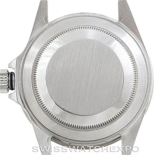 This image shows the back case of a Rolex Submariner 16610 Men
s Stainless Steel Black Dial 16610 Men
s Stainless Steel Black Dial watch, viewed from a straight overhead angle.