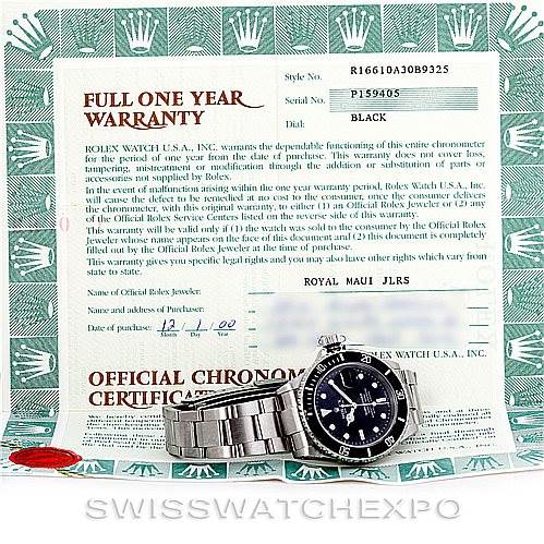 The image shows a Rolex Submariner 16610 Men
s Stainless Steel Black Dial 16610 Men
s Stainless Steel Black Dial watch face and bracelet lying on a warranty certificate.