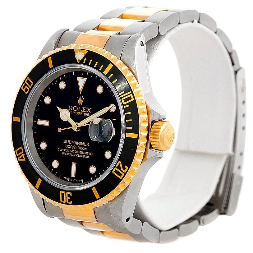 The image shows a Rolex Submariner 16613 Men's Steel and Gold (two tone) Black Dial 16613 Men's Steel and Gold (two tone) Black Dial watch at an angled side view, displaying its black dial, bezel, and two-tone bracelet.