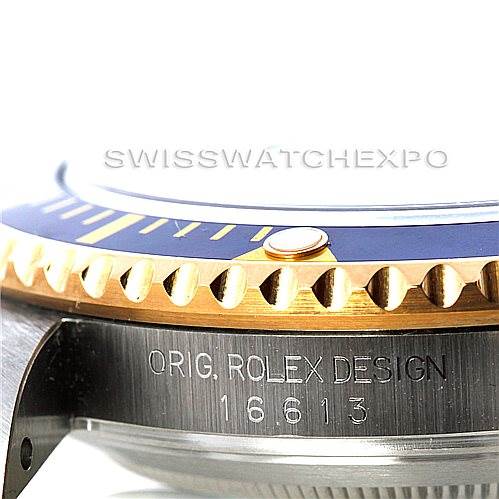 This is a close-up side view of a Rolex Submariner 16613 Men's Steel and Gold (two tone) Blue Dial 16613 Men's Steel and Gold (two tone) Blue Dial, focusing on the bezel and the engraved model number 16613.