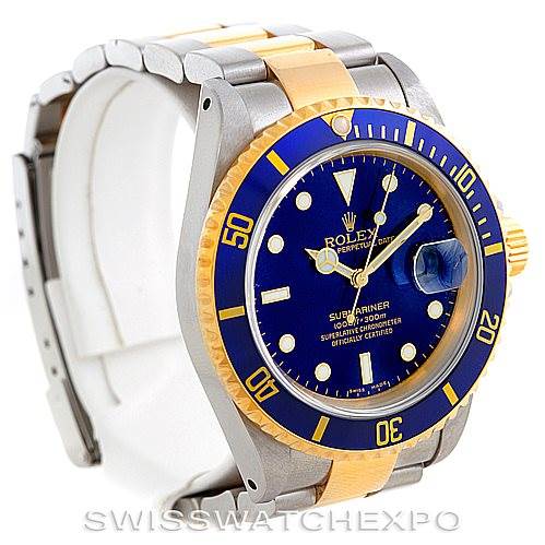 The image shows a Rolex Submariner 16613 Men's Steel and Gold (two tone) Blue Dial 16613 Men's Steel and Gold (two tone) Blue Dial watch at a three-quarter angle, highlighting its blue and gold bezel and bracelet.