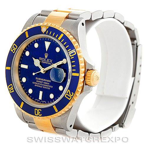 The image shows a Rolex Submariner 16613 Men's Steel and Gold (two tone) Blue Dial 16613 Men's Steel and Gold (two tone) Blue Dial watch at a three-quarter angle, highlighting the bezel, dial, crown, and bracelet.