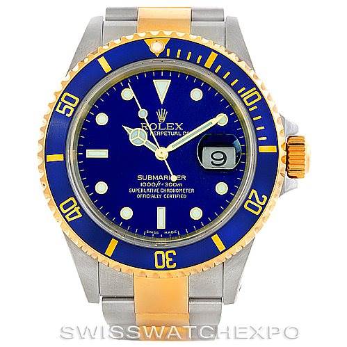 The Rolex Submariner 16613 Men's Steel and Gold (two tone) Blue Dial 16613 Men's Steel and Gold (two tone) Blue Dial watch is shown from a front angle, highlighting its blue dial, bezel, and two-tone bracelet.
