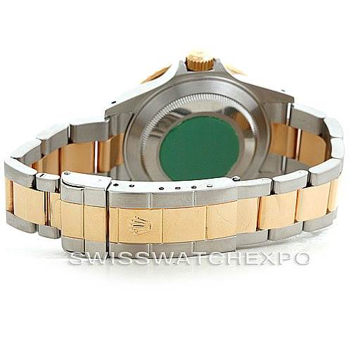 The image shows the back and clasp of the Rolex Submariner 16613 Men's Steel and Gold (two tone) Blue Dial 16613 Men's Steel and Gold (two tone) Blue Dial, highlighting its two-tone bracelet and crown logo on the clasp.