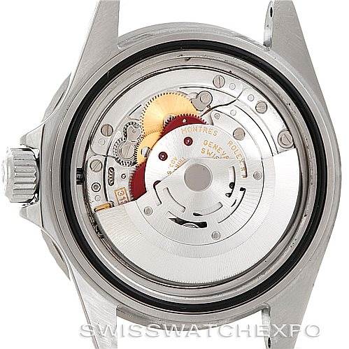 This is an image of the back view of a Rolex Submariner 16610 Men's Stainless Steel Black Dial 16610 Men's Stainless Steel Black Dial, showing its mechanical movement and internal components.