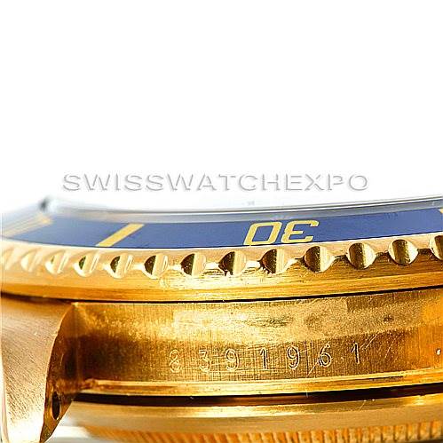 This is a close-up of the side view of a Rolex Submariner 16808 Men's Yellow Gold Blue Dial 16808 Men's Yellow Gold Blue Dial, showing the bezel, part of the case, and the model number.