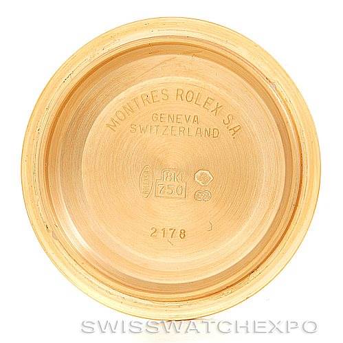 The image shows the inner case back of a Rolex Submariner 16618 Men's Yellow Gold Blue Dial 16618 Men's Yellow Gold Blue Dial watch, displaying the brand’s engravings and markings.