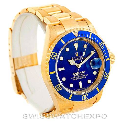 This image shows a Rolex Submariner 16618 Men's Yellow Gold Blue Dial 16618 Men's Yellow Gold Blue Dial watch at an angled side view, highlighting its gold bracelet, blue dial, and bezel.