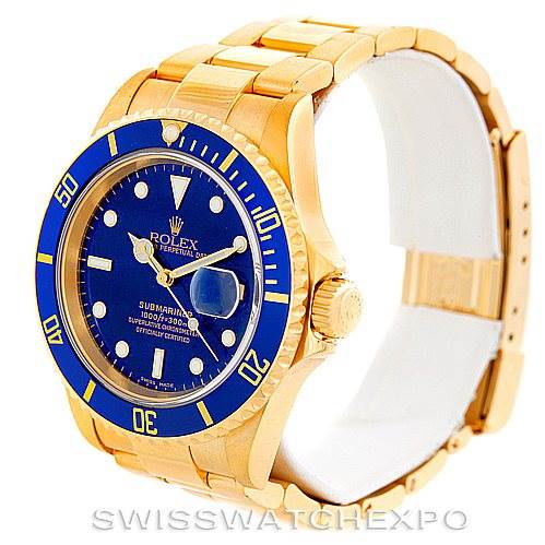 This image shows a side angle of a Rolex Submariner 16618 Men's Yellow Gold Blue Dial 16618 Men's Yellow Gold Blue Dial watch, highlighting its gold case, blue dial, and bezel, along with the bracelet.