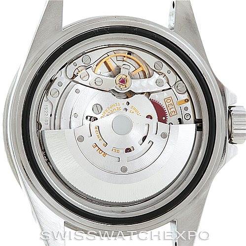 The image shows the back view of the Rolex Submariner 14060 Men's Stainless Steel Black Dial 14060 Men's Stainless Steel Black Dial watch, revealing its intricate movement and inner mechanisms.