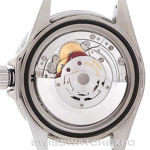 This image shows the back view of a Rolex Submariner 16610 Men's Stainless Steel Black Dial 16610 Men's Stainless Steel Black Dial watch, revealing its internal mechanical movement and components.