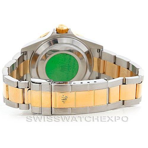 This image shows the back case and bracelet of a Rolex Submariner 16613 Men's Steel and Gold (two tone) Grey Dial 16613 Men's Steel and Gold (two tone) Grey Dial, highlighting the two-tone metal design.