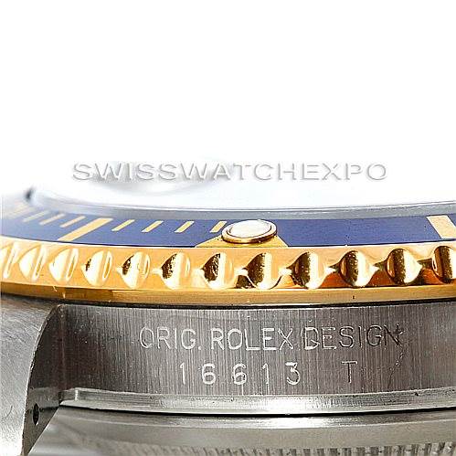 This image shows a close-up side view of the bezel and case side of a Rolex Submariner 16613 Men's Steel and Gold (two tone) Grey Dial 16613 Men's Steel and Gold (two tone) Grey Dial, highlighting the model number.