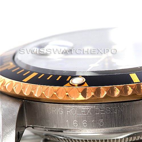 The image shows a close-up of the bezel and casing of a Rolex Submariner 16613 Men
s Steel and Gold (two tone) Black Dial 16613 Men
s Steel and Gold (two tone) Black Dial, highlighting the model number 16613.