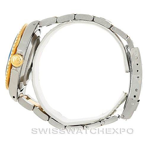 The image shows a side view of a Rolex Submariner 16613 Men
s Steel and Gold (two tone) Black Dial 16613 Men
s Steel and Gold (two tone) Black Dial watch, highlighting the bracelet, crown, and side of the case.