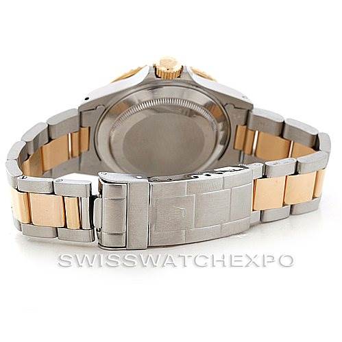 This image shows the back side of a Rolex Submariner 16613 Men
s Steel and Gold (two tone) Black Dial 16613 Men
s Steel and Gold (two tone) Black Dial watch, focusing on the clasp and bracelet.