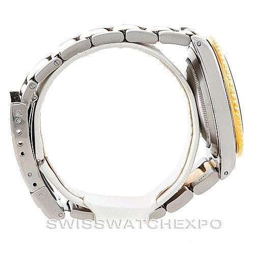 This image shows a side view of the Rolex Submariner 16613 Men's Steel and Gold (two tone) Blue Dial 16613 Men's Steel and Gold (two tone) Blue Dial watch, highlighting its case, bracelet, and crown.