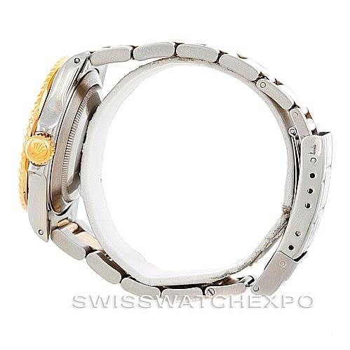 This image shows a side view of a Rolex Submariner 16613 Men's Steel and Gold (two tone) Blue Dial 16613 Men's Steel and Gold (two tone) Blue Dial watch highlighting the crown, bezel, case, and bracelet.