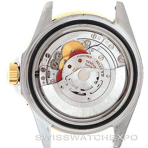 The image shows a back view of a Rolex Submariner 16613 Men's Steel and Gold (two tone) Blue Dial 16613 Men's Steel and Gold (two tone) Blue Dial watch, displaying its internal mechanical components.