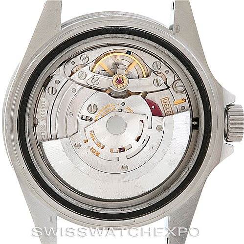 This image shows the back view of a Rolex Submariner 14060 Men's Stainless Steel Black Dial 14060 Men's Stainless Steel Black Dial, revealing its internal mechanical movement.