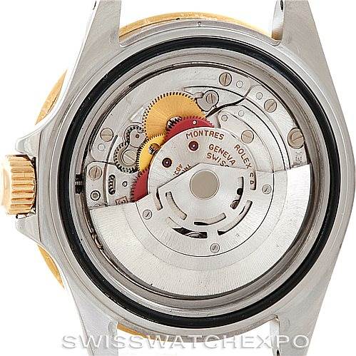 This image shows the back case of a Rolex Submariner 16613 Men
s Steel and Gold (two tone) Blue Dial 16613 Men
s Steel and Gold (two tone) Blue Dial watch, displaying its internal mechanical movement.