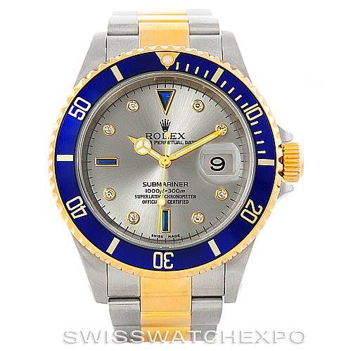 This image shows a front view of a Rolex Submariner 16613 Men's Steel and Gold (two tone) Grey Dial 16613 Men's Steel and Gold (two tone) Grey Dial watch featuring a blue bezel, grey dial, and two-tone bracelet.