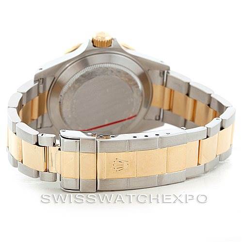 The image shows the back case and bracelet of a Rolex Submariner 16613 Men's Steel and Gold (two tone) Grey Dial 16613 Men's Steel and Gold (two tone) Grey Dial watch, featuring a two-tone metal design.
