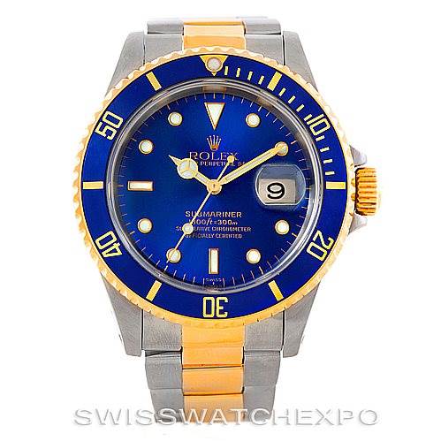 The image shows a front view of a Rolex Submariner 16613 Men
s Steel and Gold (two tone) Blue Dial 16613 Men
s Steel and Gold (two tone) Blue Dial watch with a blue dial, yellow gold accents, and a two-tone bracelet.