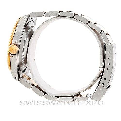 This image shows a side view of a Rolex Submariner 16613 Men
s Steel and Gold (two tone) Blue Dial 16613 Men
s Steel and Gold (two tone) Blue Dial watch, highlighting the crown, case, and bracelet.